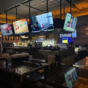 Bar area with  plenty of TVs.