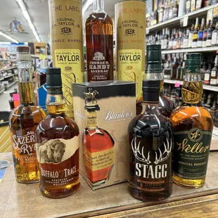 a variety of bottles of whiskey