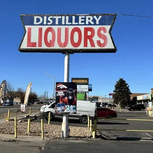a sign for a liquor company