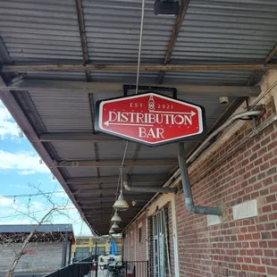 a sign for distribution bar