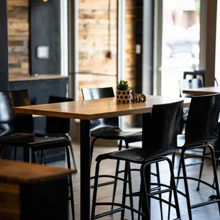 a table and chairs in a restaurant