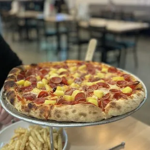 Pepperoni + pineapple pizza, and crinkle cut sea salt fries
