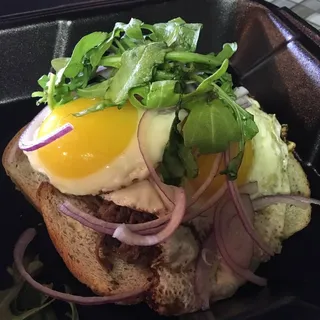 Open Faced Braised Beef with Arugula and Eggs Plate