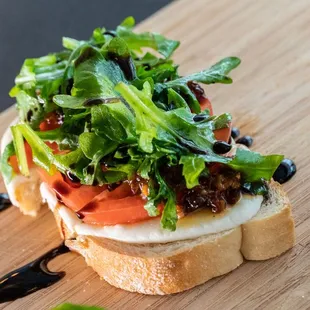 a sandwich on a cutting board