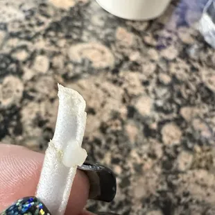 Piece of styrofoam in noodle souo