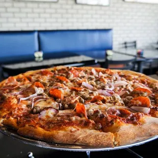 a pizza on a serving tray