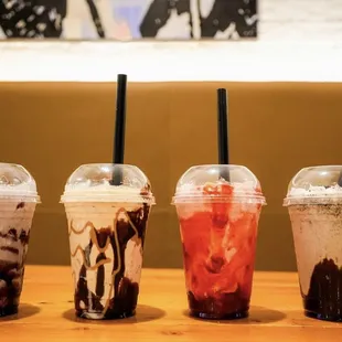 a row of iced coffees