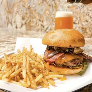 a plate of fries and a beer