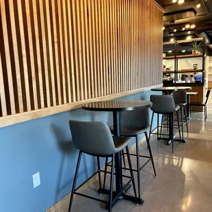 tables and chairs in a coffee shop