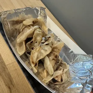 a plate of dumplings on a table
