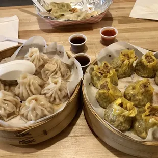 Soup dumplings, chicken shai mei, pan fried chicken and basil dumplings for lunch today. It's average Americanized dumpling shop.
