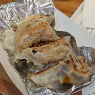 Pan fried dumplings. Mixed flavors.