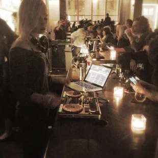 DJ Cherry spins the tunes easily bringing a Friday night party to Tuesday nights at District M!