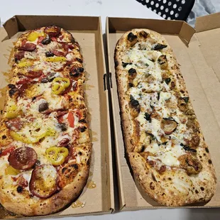 Weirdough standards pizza (Margherita pizza)  Mad pizza with pepperoni banana peppers olives and arugala