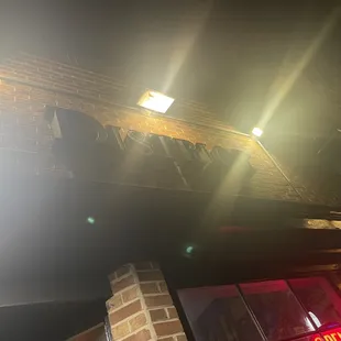 a brick building at night with bright lights