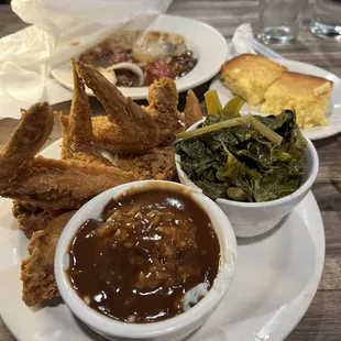 Sausage with gravy and rice for wings, rice and gravy with onions and collard greens