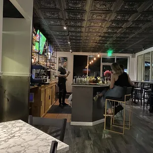 Bar area serving craft beer and wine.