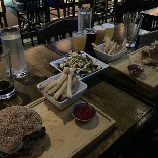 Stouts, a flight of Hazy IPAs, Parmesan fries, and Brussels sprouts