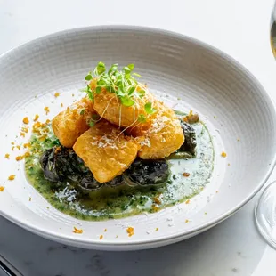 Escargot &amp; Gnocchi with gruyère, pickled beech mushrooms, compound butter and bottarga