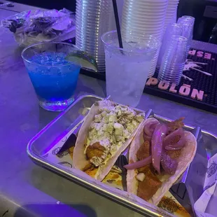 Cochinita Pibil taco and Nashville Hot Taco