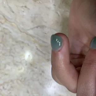 The manicurist cut near my nail.