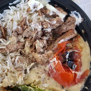 Dried Chicken Shawarma bowl with undercooked, flavorless rice