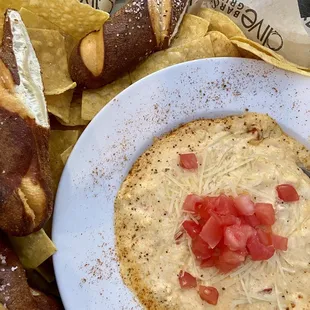Crab dip with chips and pretzels