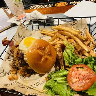 Homewrecker Burger: braised short rib, sunny egg, bacon, fries