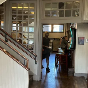 Hallway to the bar and stairs to the second floor