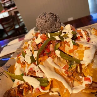 nachos with cheese on top