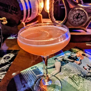 a cocktail in a coupe glass