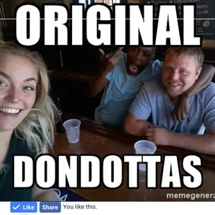 a group of people sitting at a table