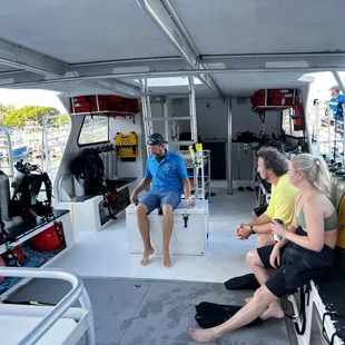 Boat space and dive master conducting the discovery lecture and safety briefing.