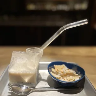 Cereal Milk immersion drink. Complete with homemade Frosted Flakes and a spork.