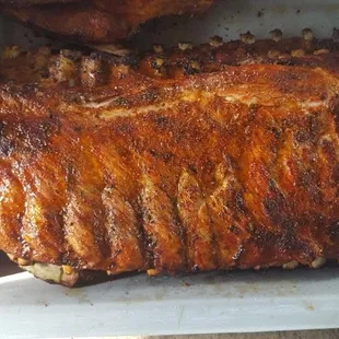 two ribs in a white container