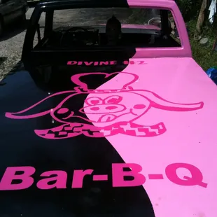 a pink and black car