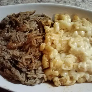 PORKY MAC out of the to go container - Excellent hot pulled pork and homemade, creamy, cheesy mac &amp; cheese. Amazing comfort food