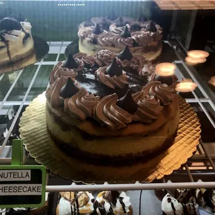 Nutella cheescake with brown frosting.