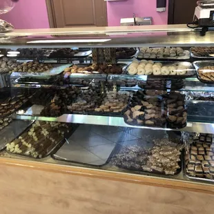 Churros, donuts, and donut holes among other delicious desserts.