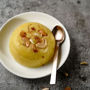 a bowl of food with a spoon
