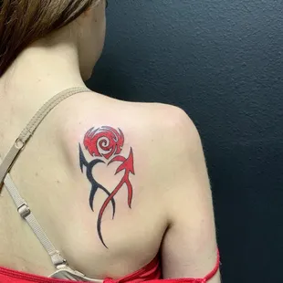 Shoulder blade tattoo
