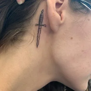 Neck tattoo
