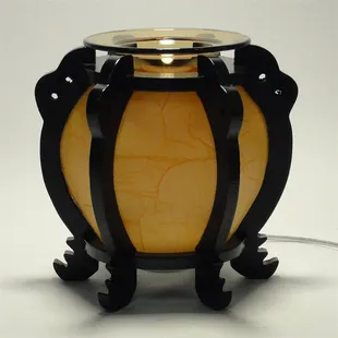 Beautiful wooden oil warmer with dimmer switch. Use with scented oils or wax chips