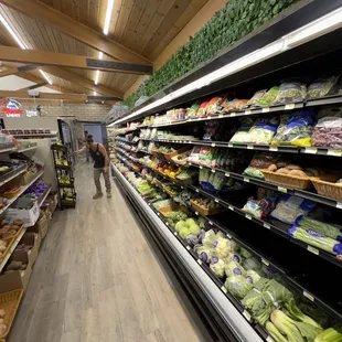 Aisle with a wall of fresh produce