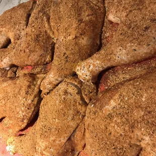 Spicy chicken quarters prep