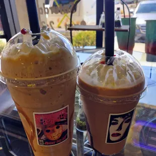 Caramel macchiato latte frap and peanut butter and chocolate protein shake.