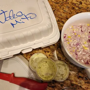 Preparing my own onion salad at home. Pollo Tropical Sauces.