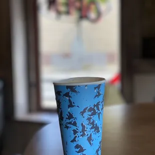 a cup of coffee on a table