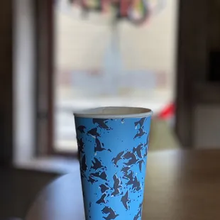a cup of coffee on a table