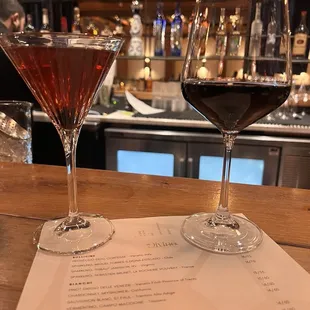 Manhattan cocktail and Bartender&apos;s choice of wine